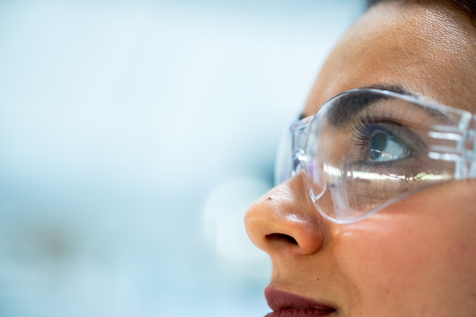 Lab technician wearing safety goggles
