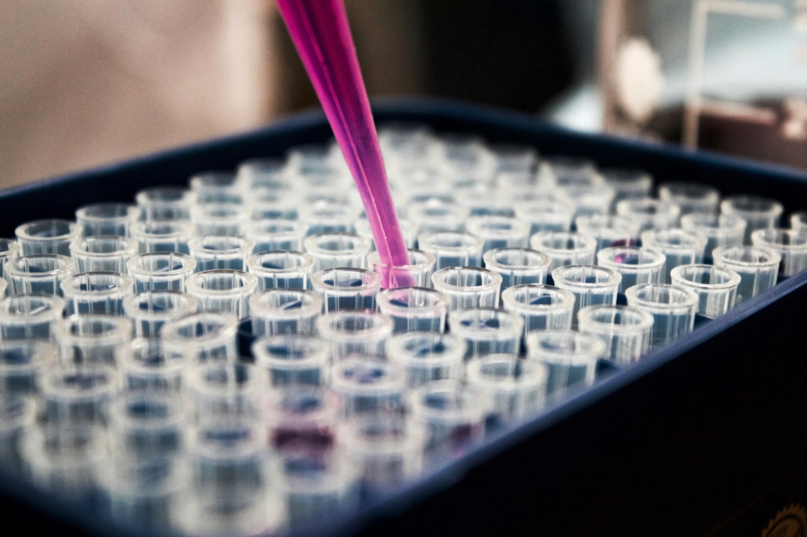 Pipette dispensing into sample microvials